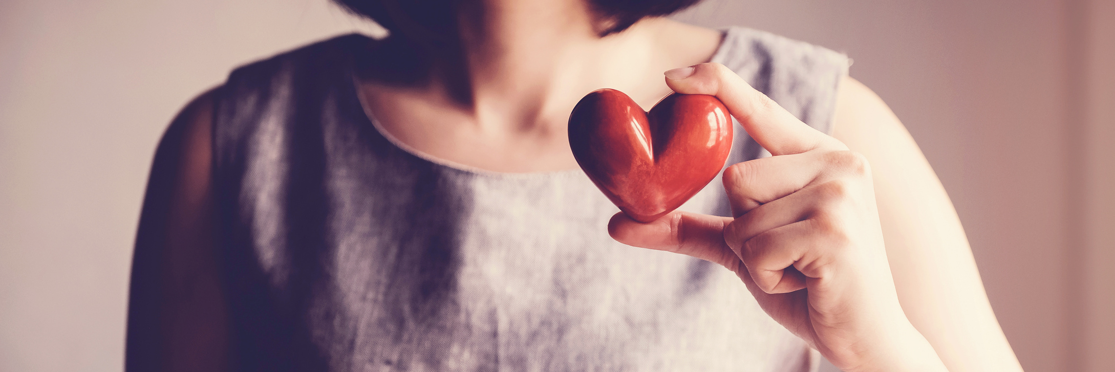 woman holding red heart, health insurance, donation charity concept, world health day, world mental health day, world heart day, foster care, gratitude, kind, thankful, hope, all lives matter concept